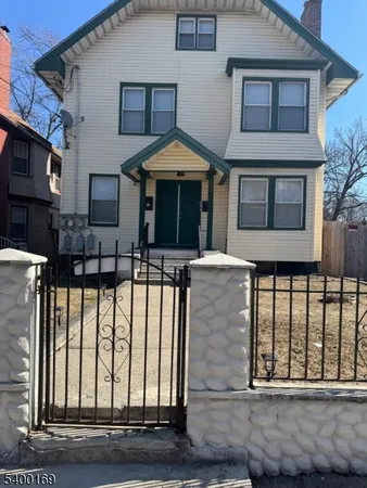 a front view of a house with a porch