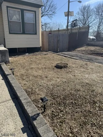 a front view of a house with yard