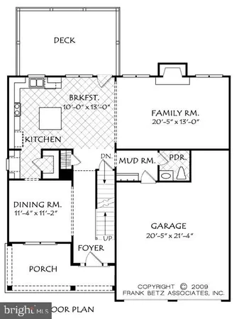 an open kitchen view with fireplace and wooden floor