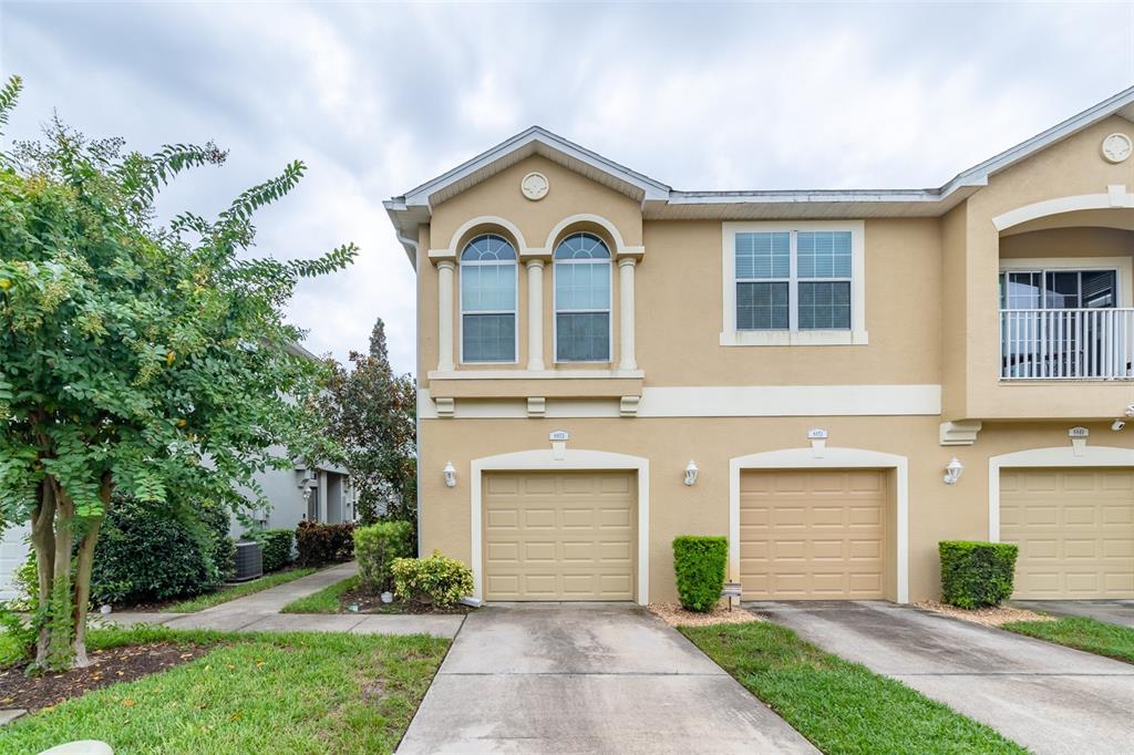 8853 Moonlit Meadows Loop Riverview, FL 33578 - Photo 1 of 1 a house view with a garden space