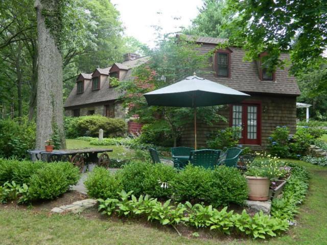 a garden view with a seating space