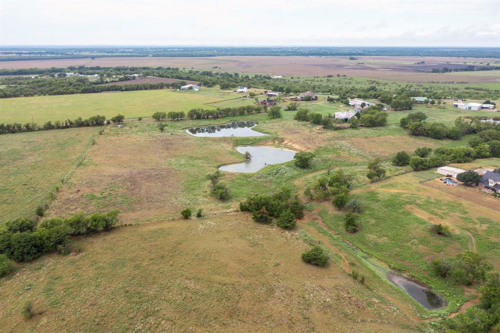 0 Kelly Forney, TX 75126 - Photo 9 of 16 an aerial view of residential houses with outdoor space