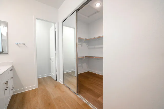 a view of a room with a wardrobe space