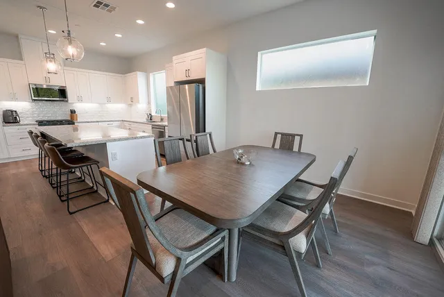 a view of a dining room with furniture