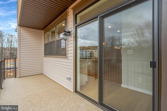 a view of a glass door and window