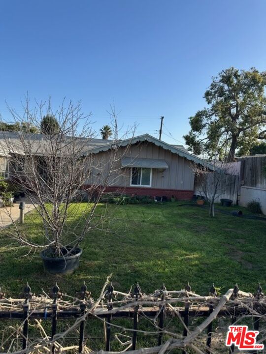 11578 Flower Street Riverside, CA 92505 - Photo 11 of 20 a front view of a house with garden