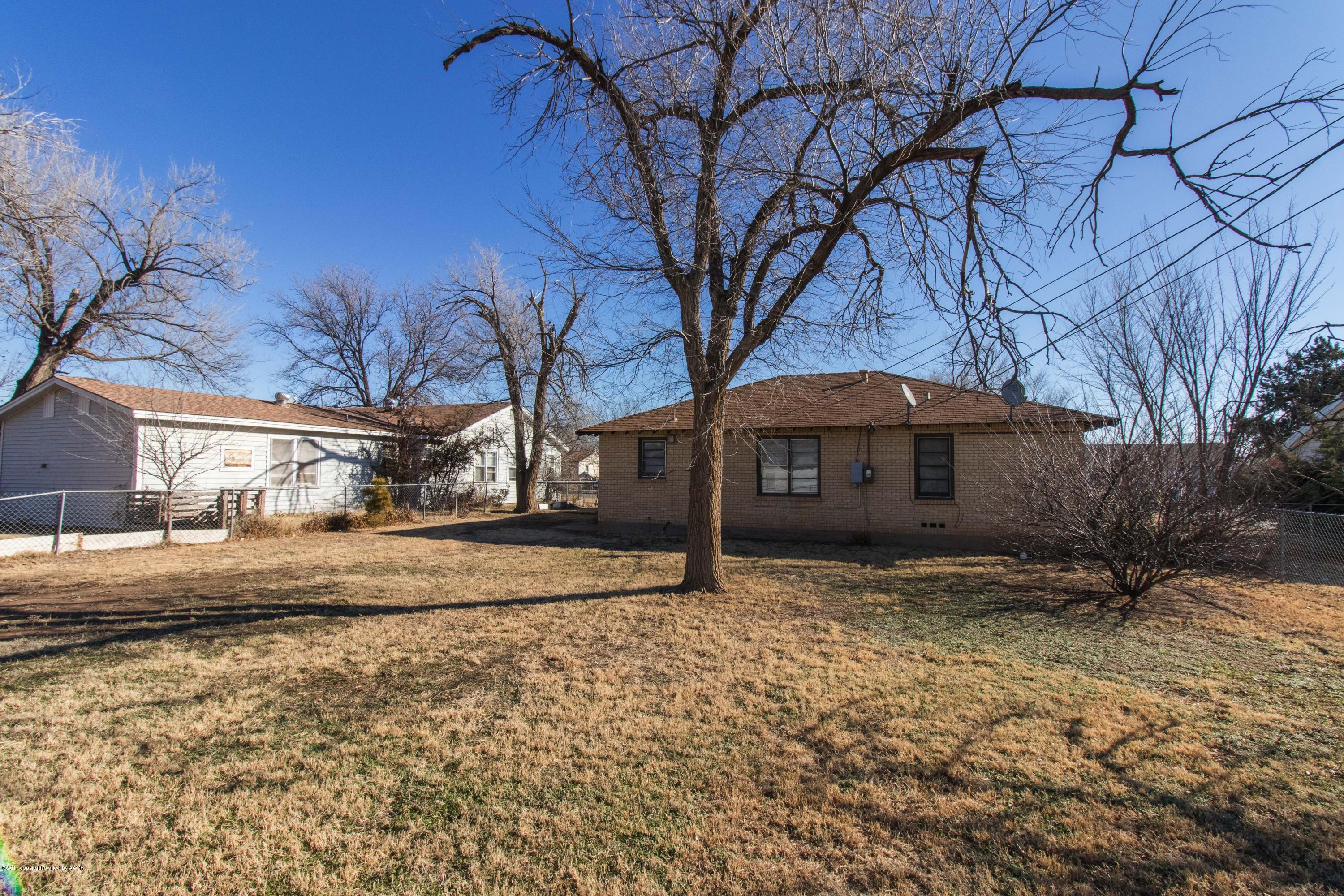 4314 Parker Street Amarillo, TX 79110 - Photo 20 of 20 a front view of a house with a yard