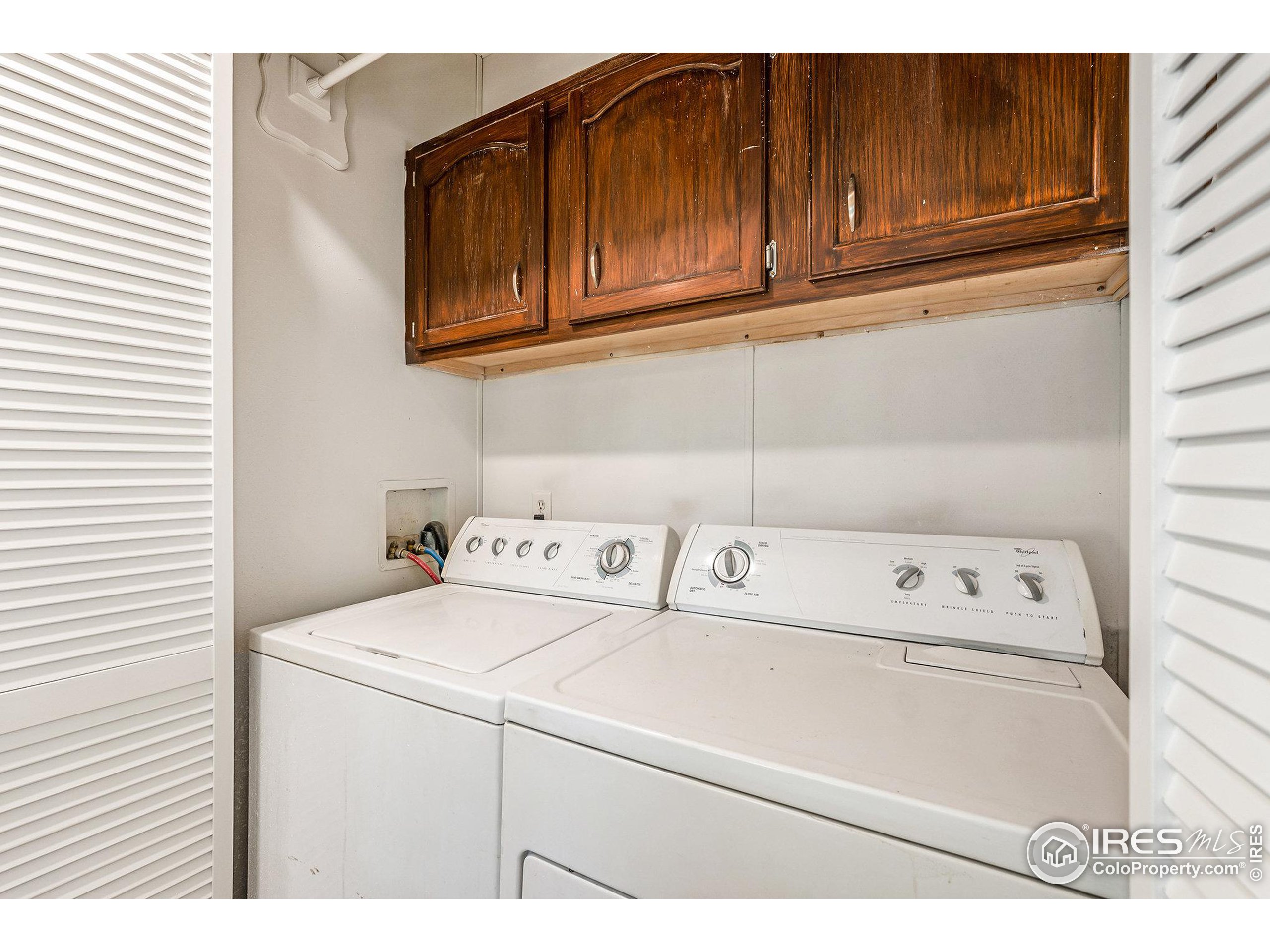 230 North 2nd Street, Unit 26 Berthoud, CO 80513 - Photo 18 of 21 a utility room with dryer and washer