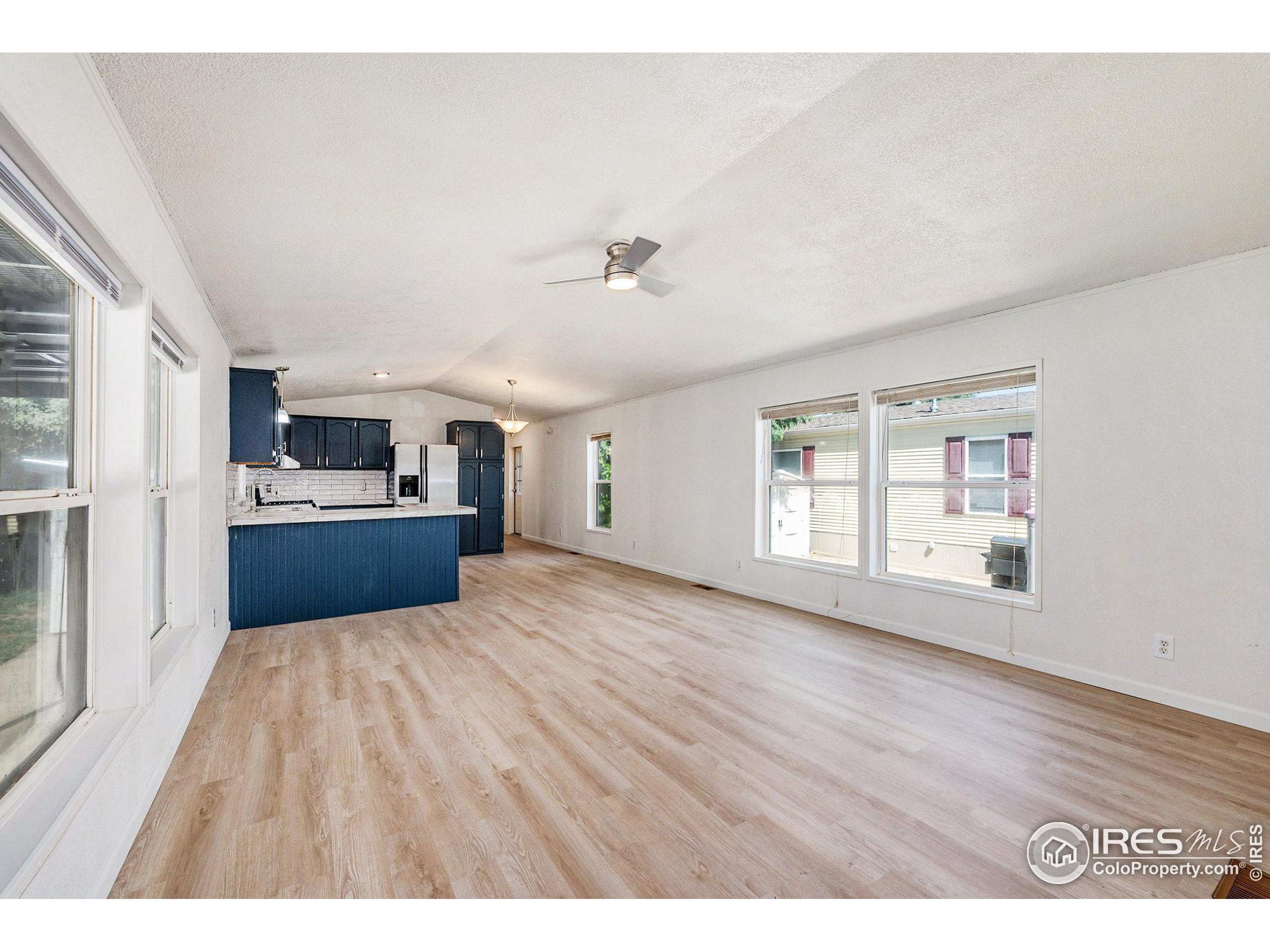 230 North 2nd Street, Unit 26 Berthoud, CO 80513 - Photo 4 of 21 a view interior of a house with wooden floor