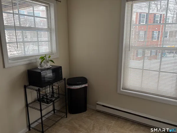 a view of a room with a window