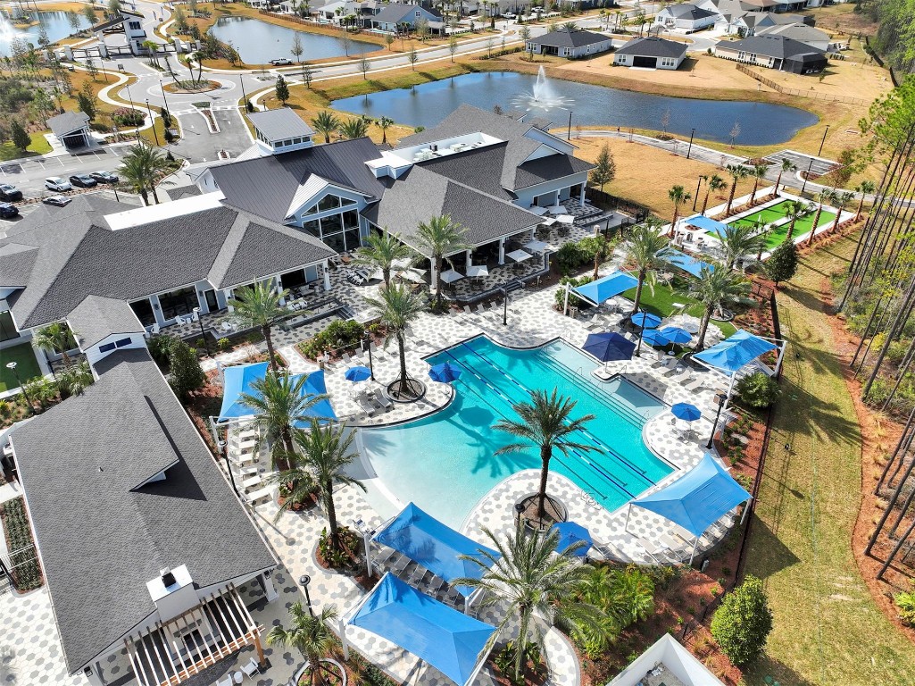636 Del Webb Parkway Yulee, FL 32097 - Photo 35 of 37 an aerial view of residential houses with outdoor space