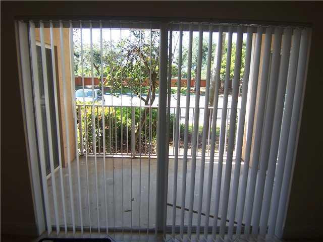 3840 Lyons Road, Unit 1032 Coconut Creek, FL 33073 - Photo 9 of 12 Patio/Deck