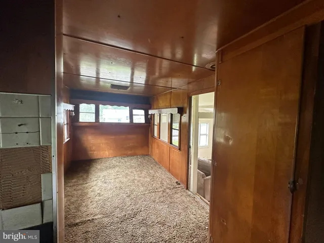 a view of room with furniture