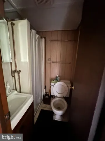 a kitchen with a stove and a microwave