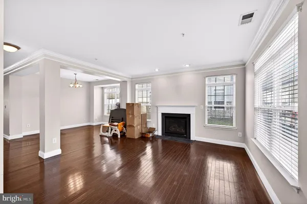 a view of a livingroom with furniture and a fireplace