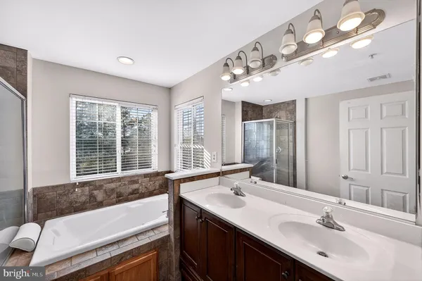 a bathroom with a shower and a toilet