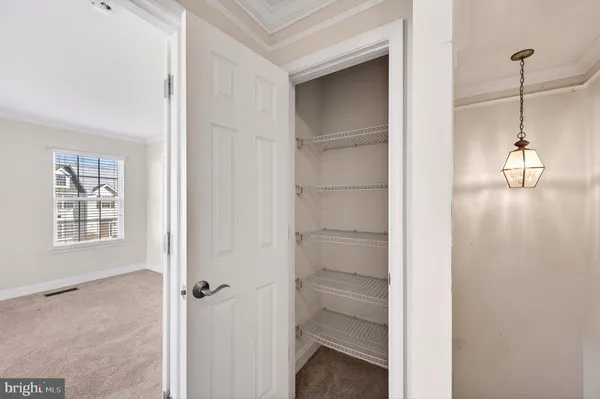 a view of a room with racks on the wall