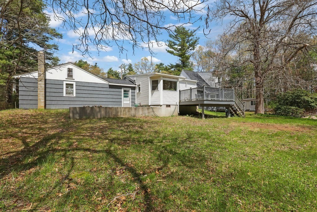 94 Fearing Hill Road Wareham, MA 02576 - Photo 32 of 41 a house that has a tree in it