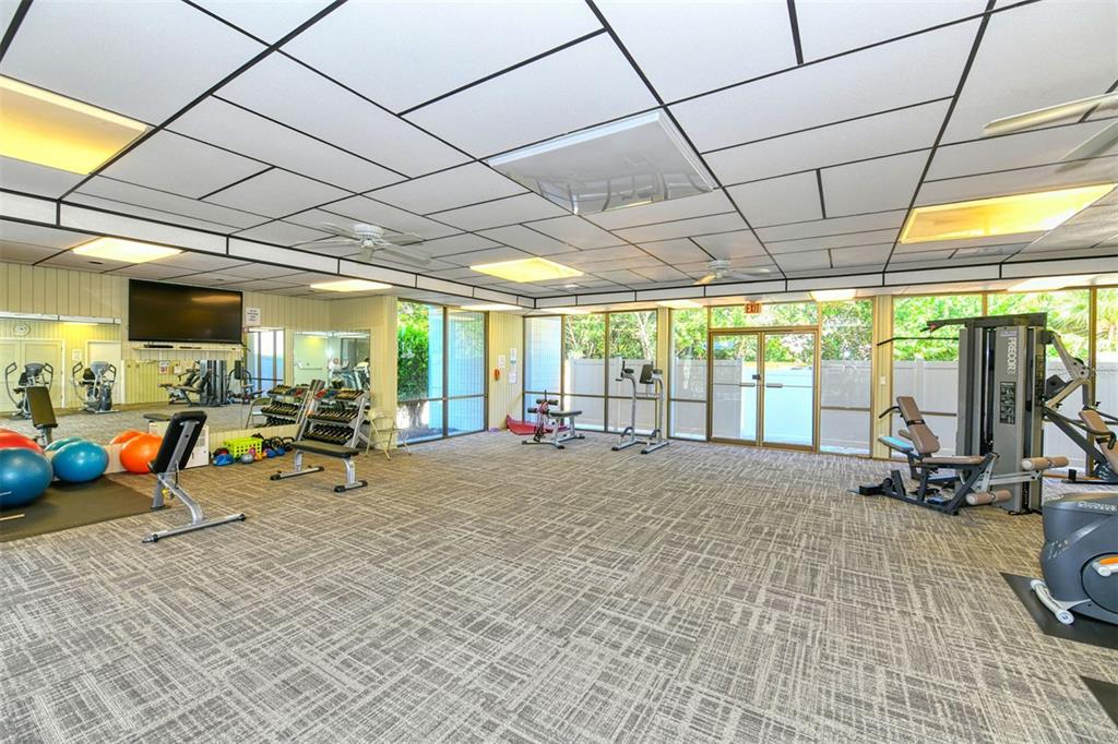 4380 Exeter Drive, Unit H103 Longboat Key, FL 34228 - Photo 34 of 51 a view of a room with gym equipment