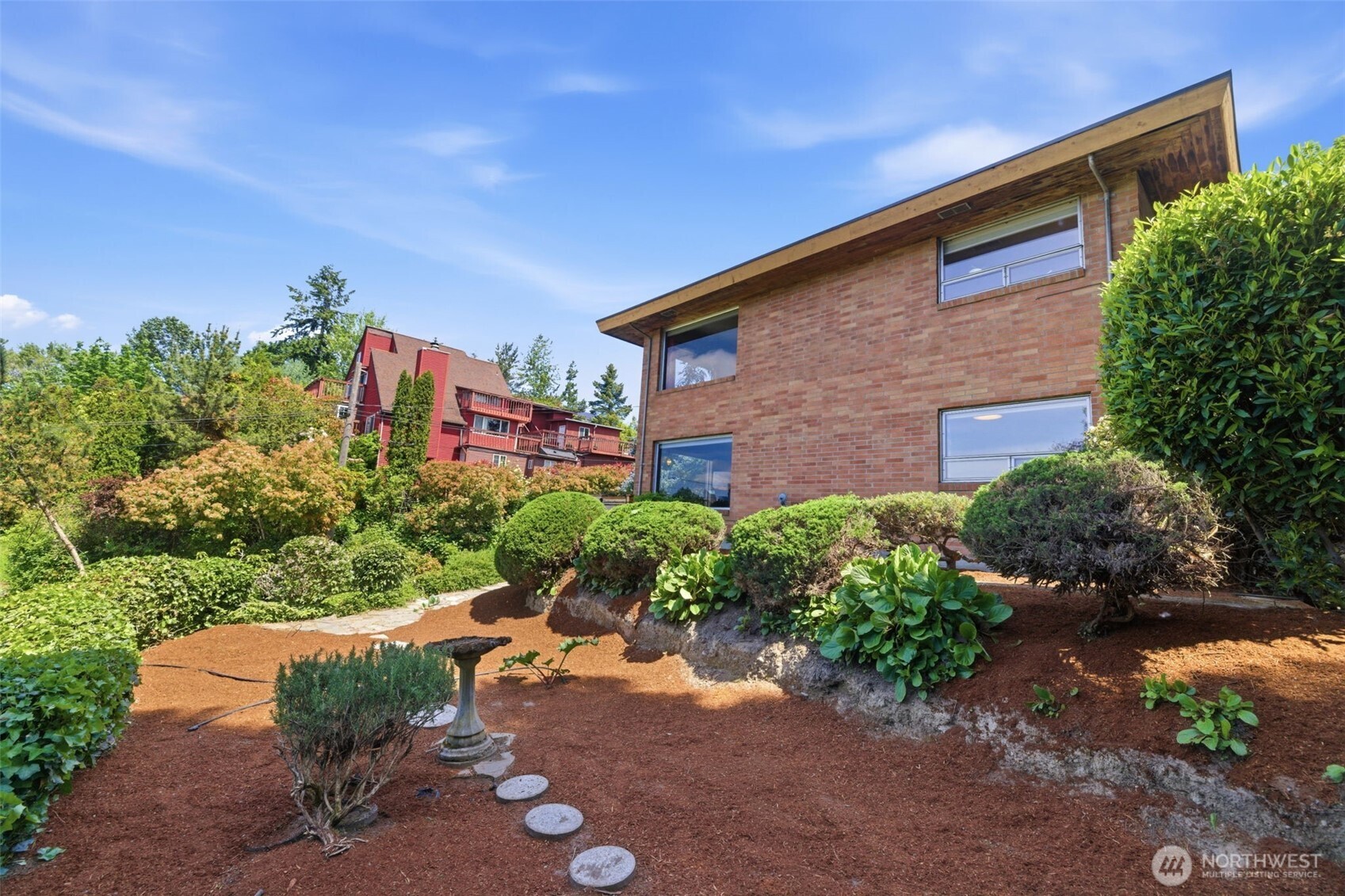 2803 South Walker Street Seattle, WA 98144 - Photo 35 of 40 a backyard of a house with outdoor seating
