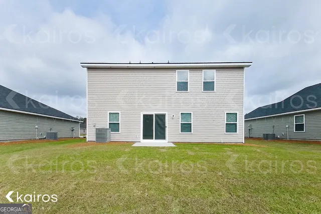 a view of building with yard