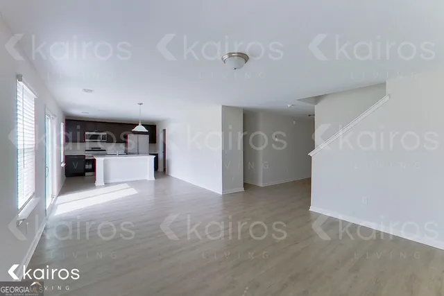 a view of a kitchen with a sink