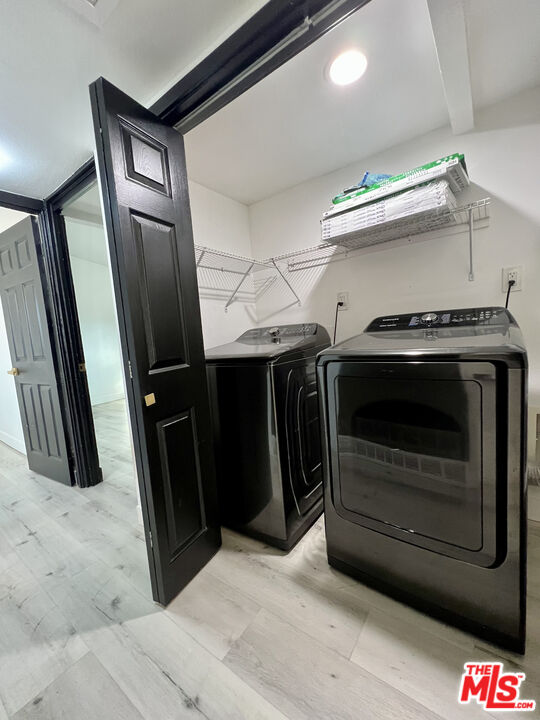 848 West Irving Place Anaheim, CA 92805 - Photo 13 of 33 a utility room with dryer and washer