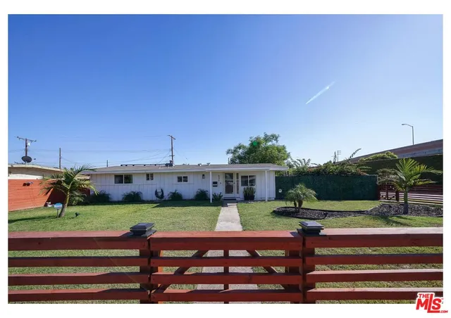 a view of a bench in front of building