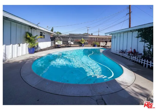 a view of a deck with a yard