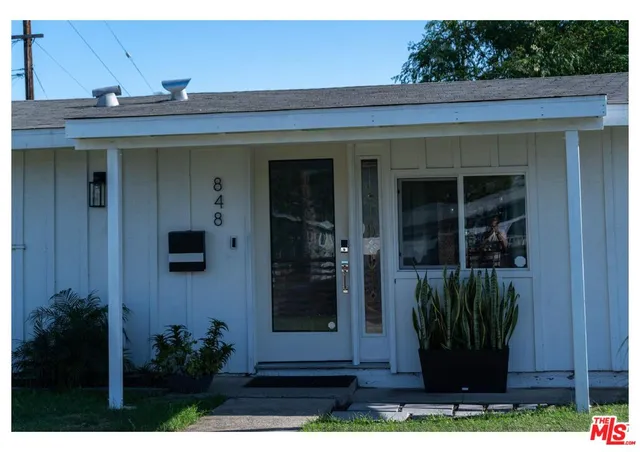 a view of a entryway door front of house
