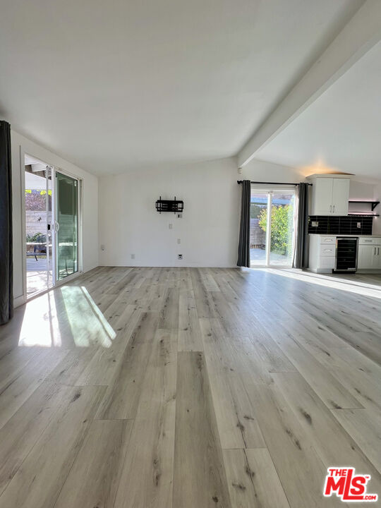 848 West Irving Place Anaheim, CA 92805 - Photo 10 of 33 a view of empty room with wooden floor
