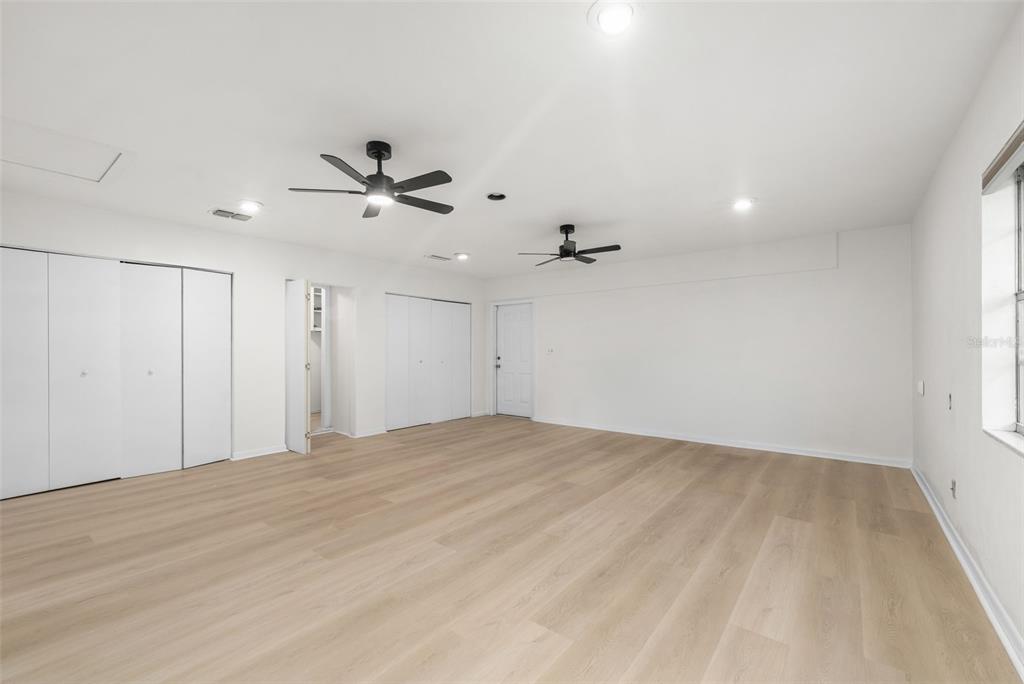4825 Southwest 19th Street Gainesville, FL 32608 - Photo 11 of 40 wooden floor in an empty room