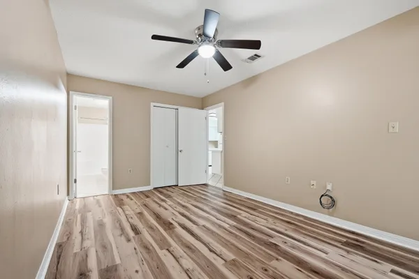 a view of a livingroom with a ceiling fan