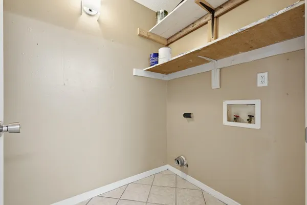 a view of a balcony with wooden floor