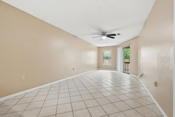 a view of an empty room and window