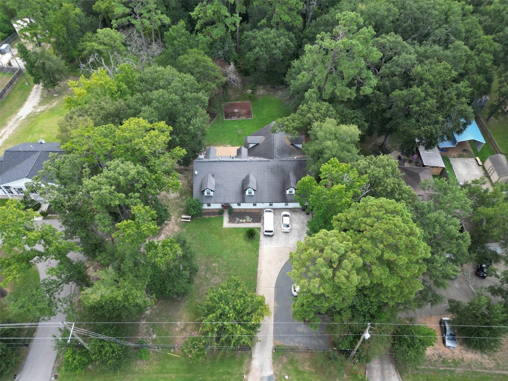 29818 East Hawthorne Drive Spring, TX 77386 - Photo 1 of 7 an aerial view of a house with outdoor space and street view