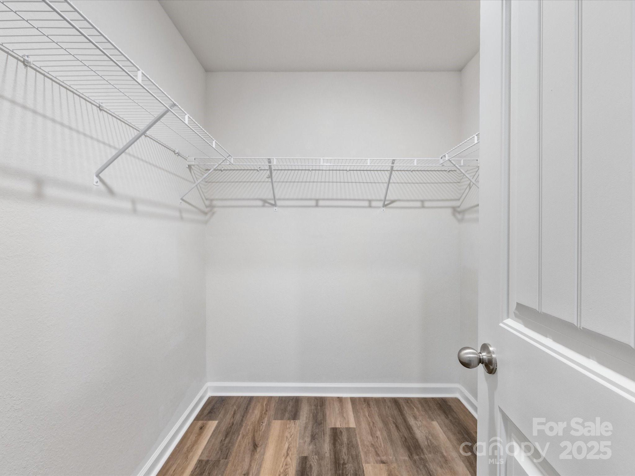 9136 Creedmore Hills Drive Charlotte, NC 28214 - Photo 35 of 48 a view of a room with racks on the wall