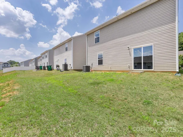 a big room with yard and plants