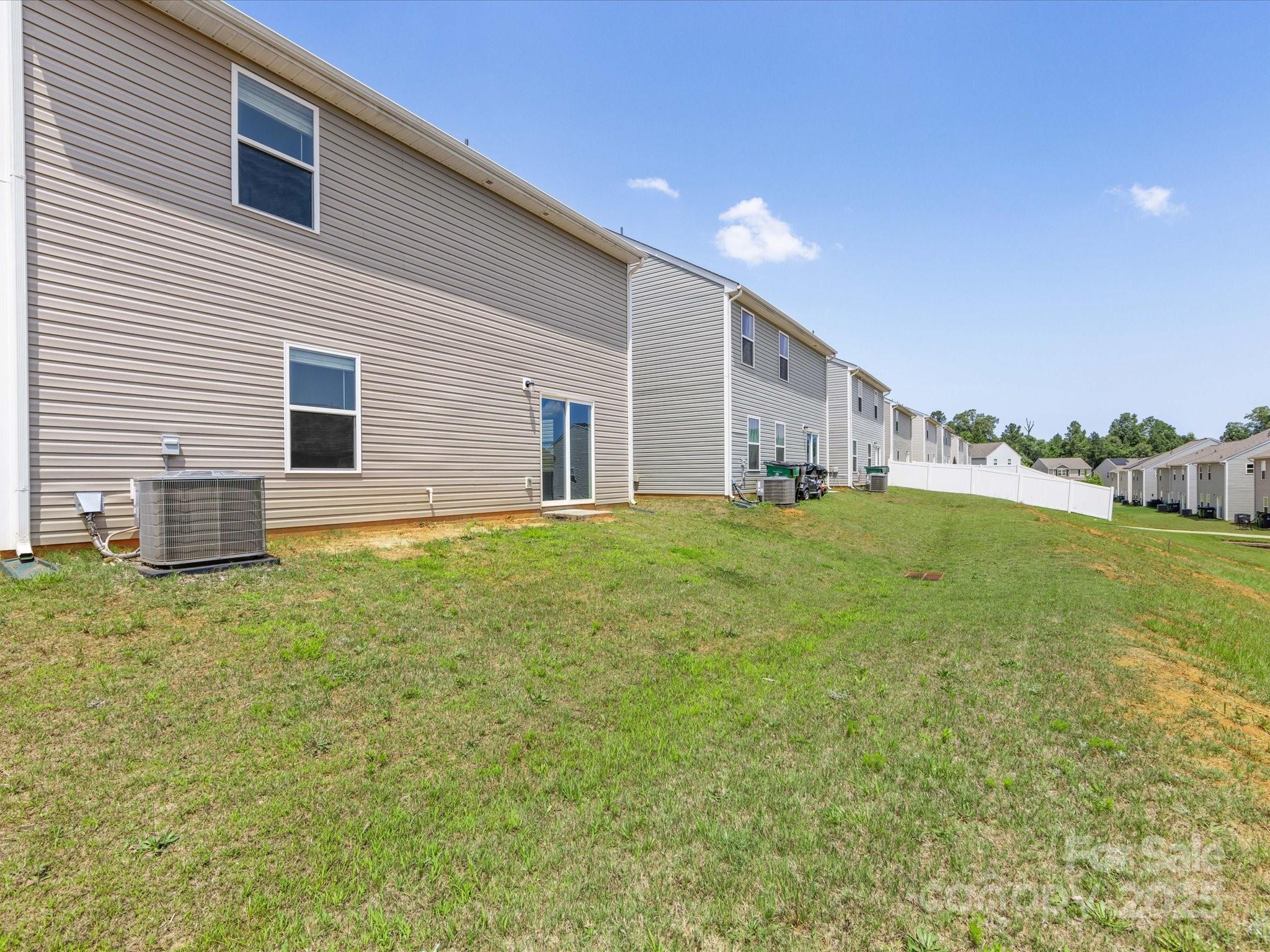 9136 Creedmore Hills Drive Charlotte, NC 28214 - Photo 48 of 48 a house view with a garden space