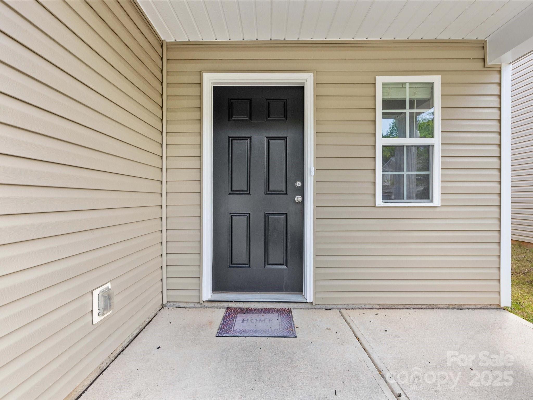 9136 Creedmore Hills Drive Charlotte, NC 28214 - Photo 5 of 48 a view of front door of house