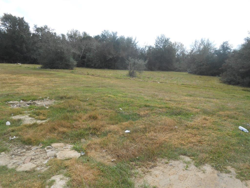 a view of a field with an outdoor space