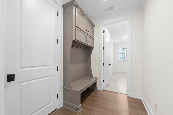 a kitchen with cabinets and window