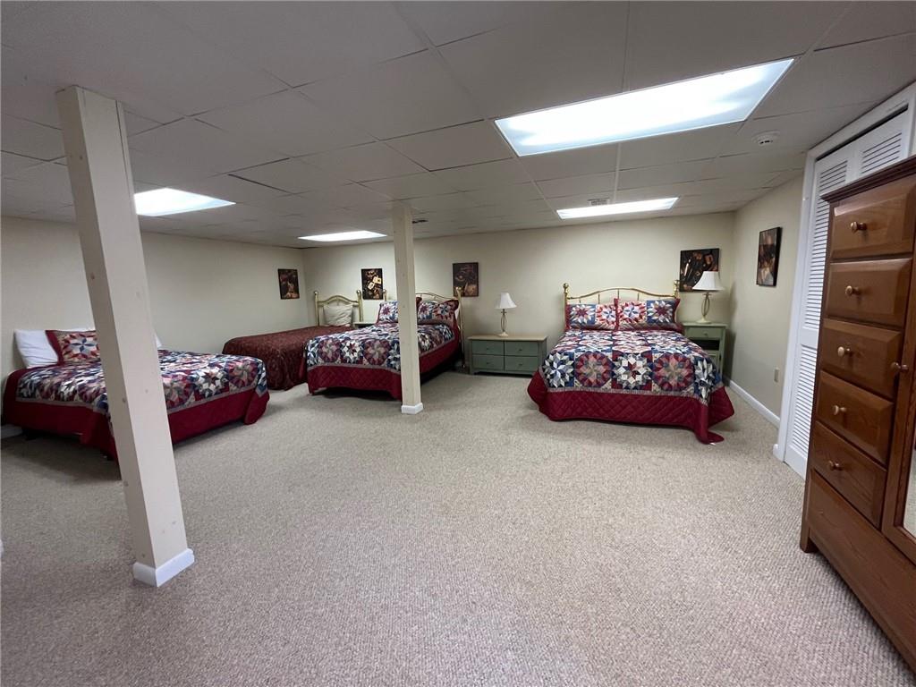 282 Alpine Heights Road Champion, PA 15622 - Photo 20 of 25 a living room with furniture and a baby crib