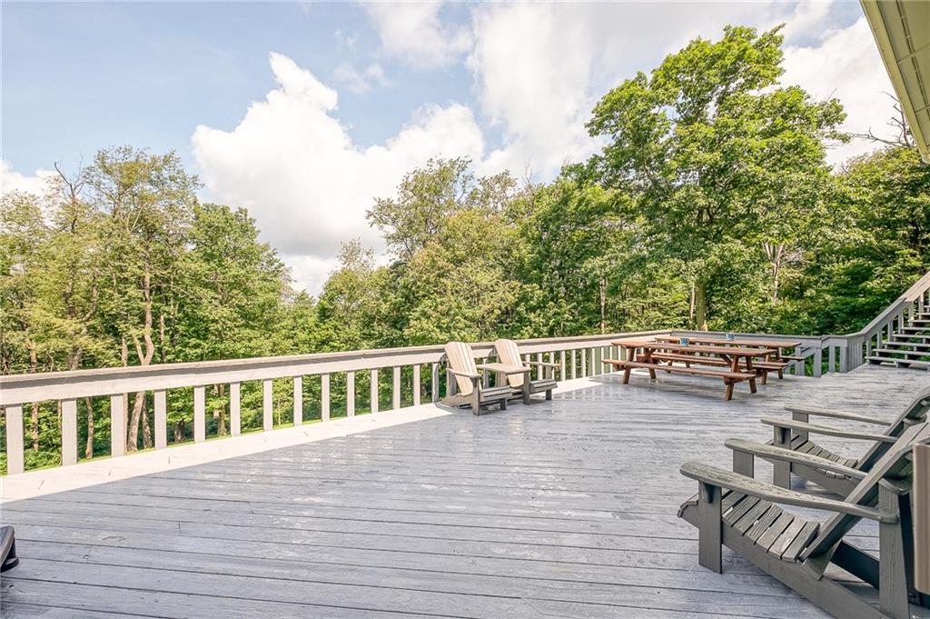 282 Alpine Heights Road Champion, PA 15622 - Photo 22 of 25 a view of balcony with deck and outdoor seating