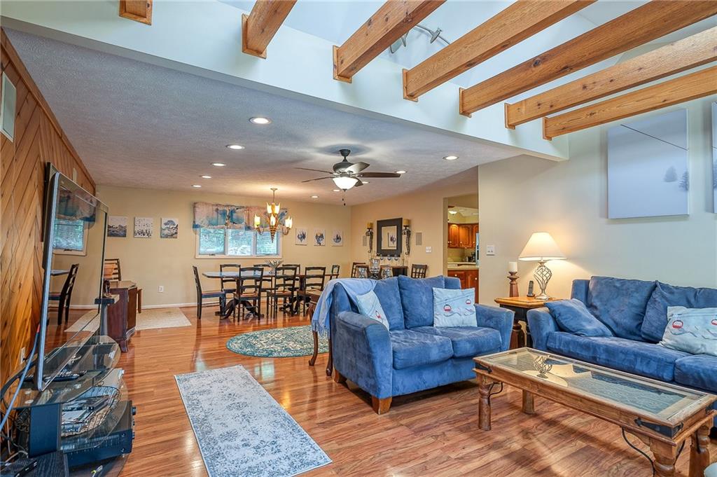 282 Alpine Heights Road Champion, PA 15622 - Photo 6 of 25 a living room with furniture and a table