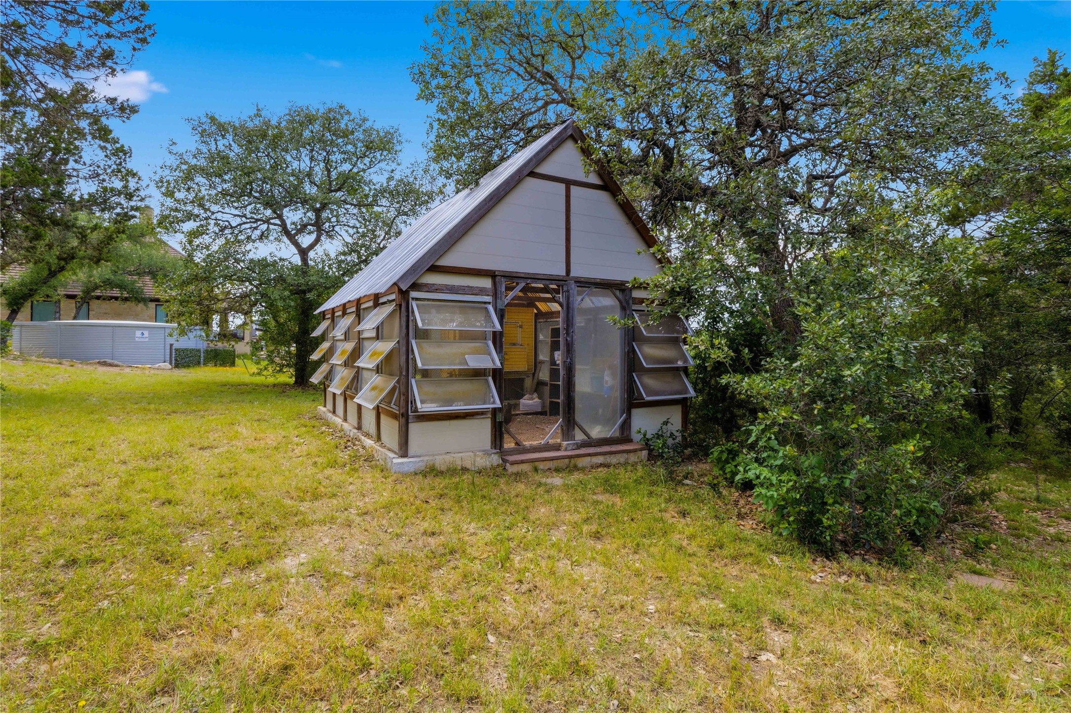 8122 Lime Creek Road Volente, TX 78641 - Photo 29 of 40 Greenhouse