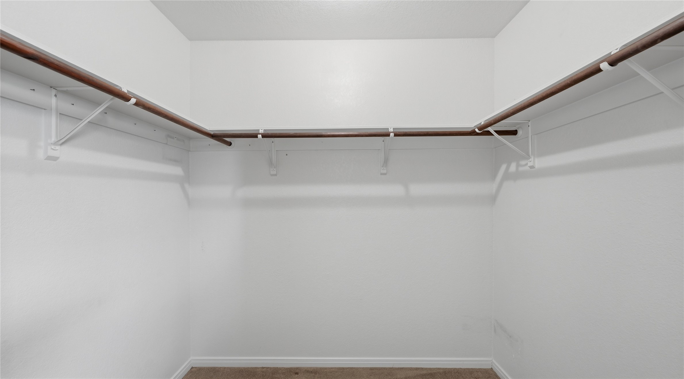 369 Young School House Road Smithville, TX 78957 - Photo 15 of 30 Walk in closet with dark carpet