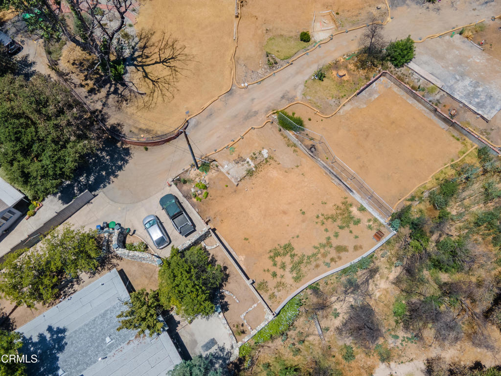 3660 Leilani Way Altadena, CA 91001 - Photo 12 of 13 an aerial view of a house with a yard and lake view