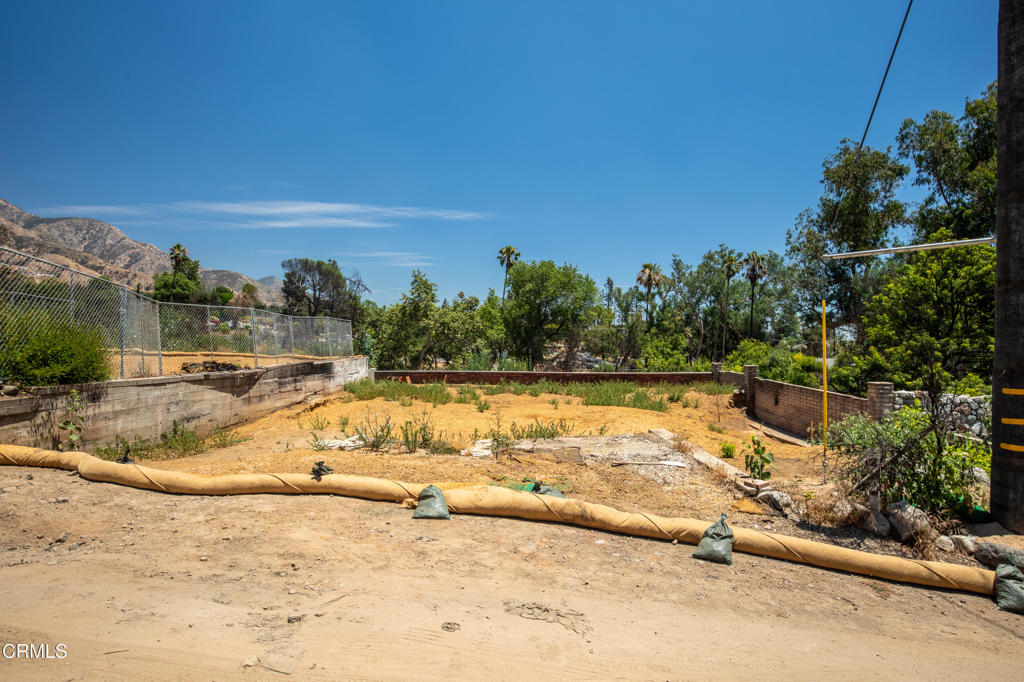3660 Leilani Way Altadena, CA 91001 - Photo 2 of 13 a view of a swimming pool with an outdoor space and seating area