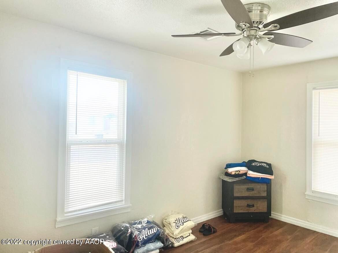 4213 South Polk Street Amarillo, TX 79110 - Photo 5 of 7 a room with a bed and a window